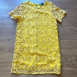 Yellow eyelet Charlie Moss mini dress.